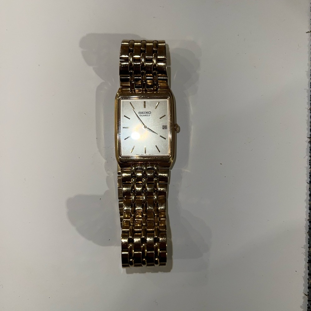Seiko Gold Timepiece with Silver Accents